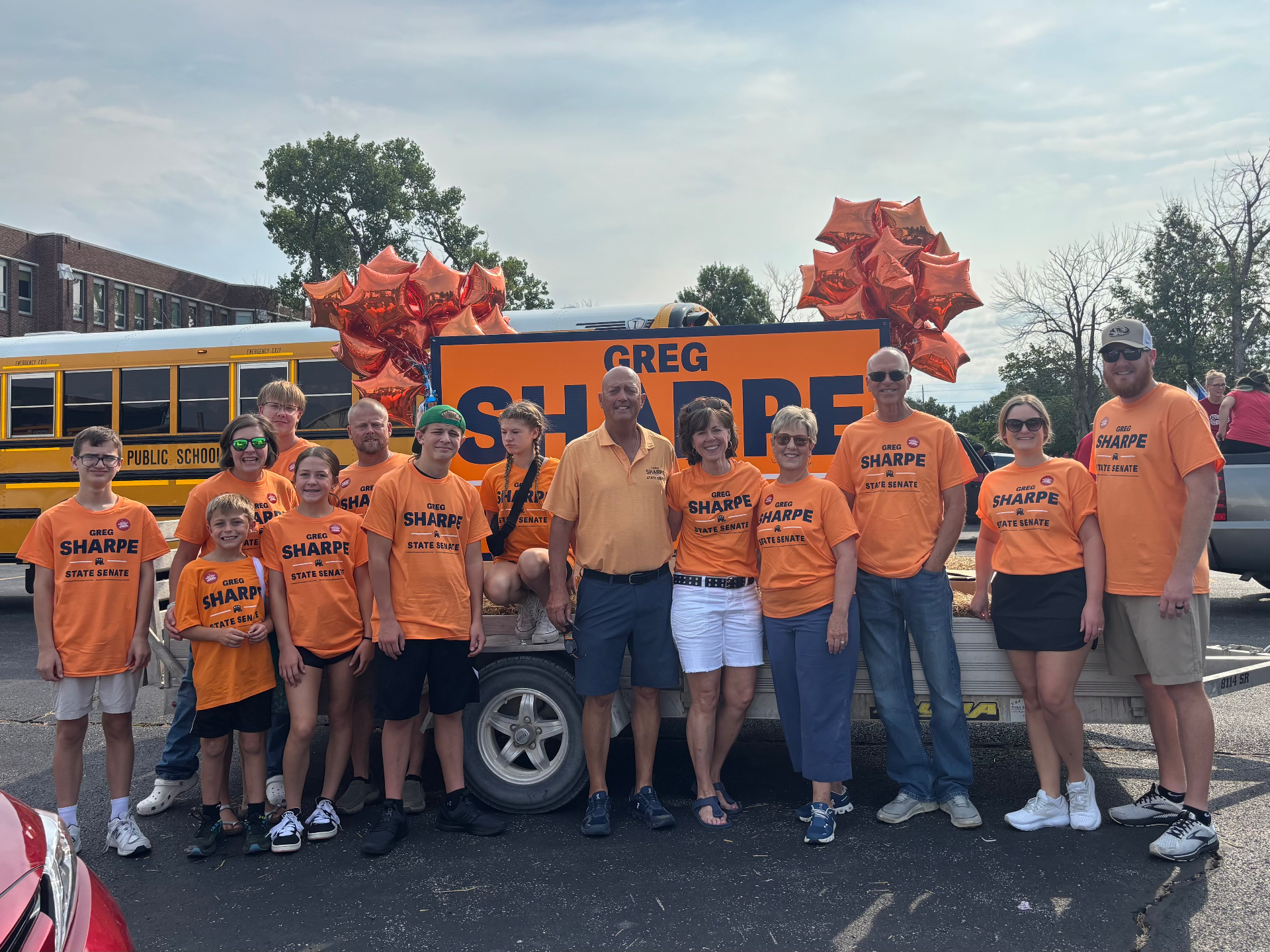 Greg Sharpe and family at a Northeast Missouri parade with supporters in Sharpe State Senate shirts